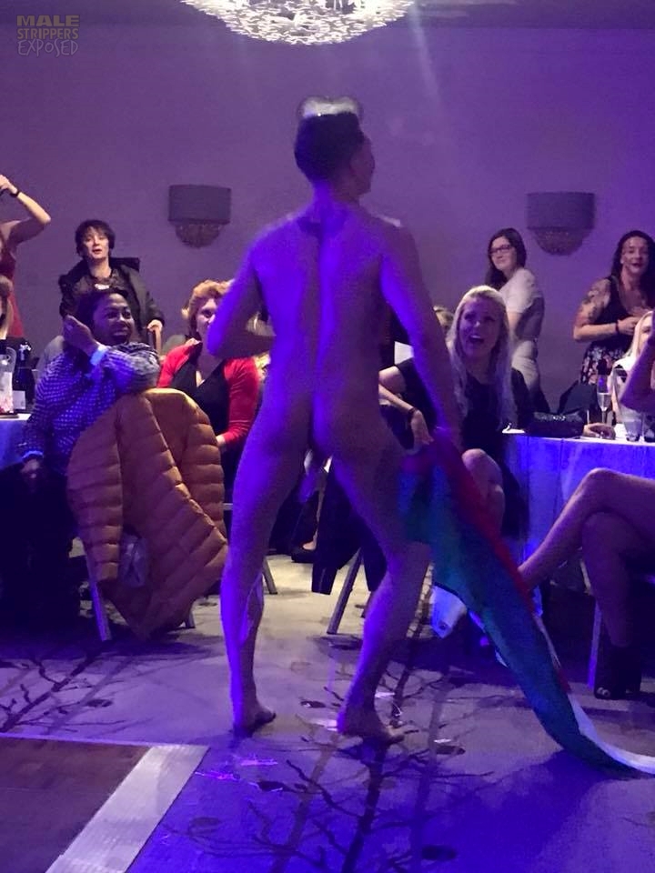 A naked male stripper shows his penis to women