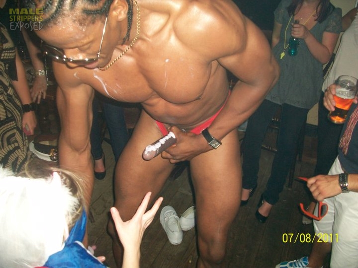 Black male stripper Tyson Brown aka Black Stallion from the Dreamboys with cream on his penis