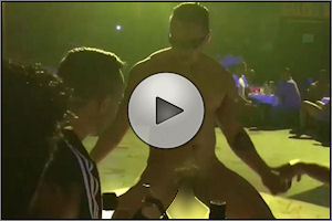 Real Latino male stripper performs in a gay bar